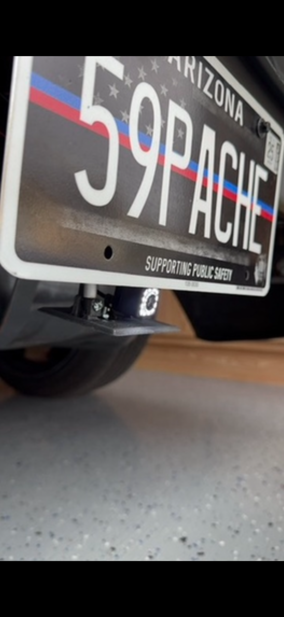 Hidden Vision camera deployed behind a license plate